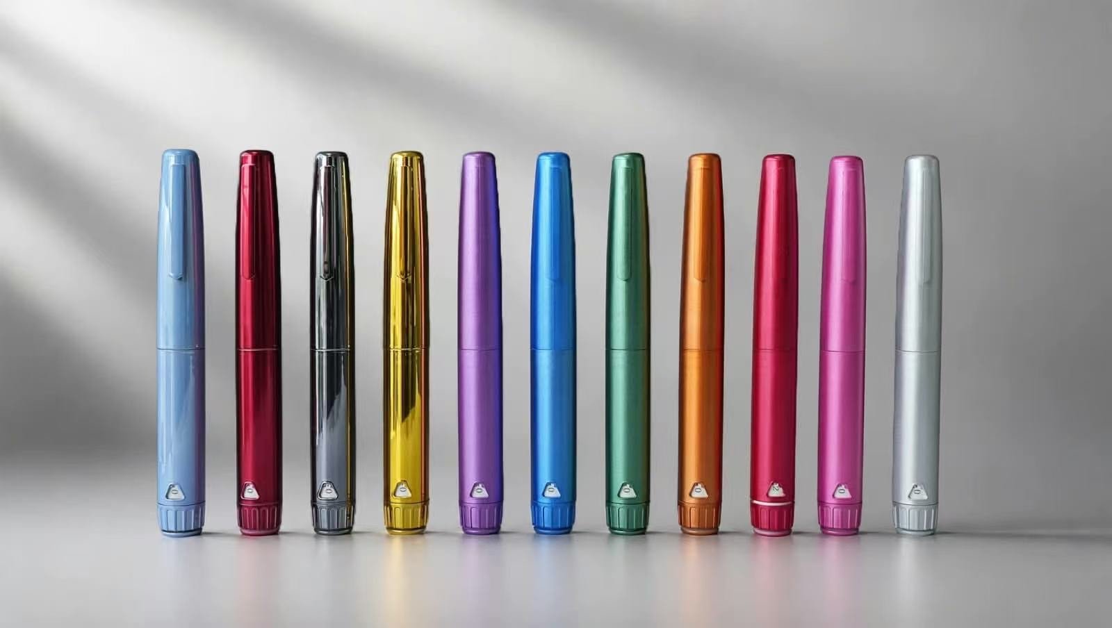 Real reusable pen samples displayed in eleven color finishes
